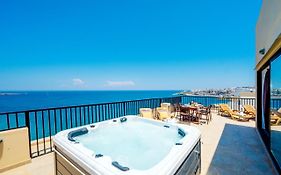 Islet Promenade Seafront Penthouse With Breathtaking Seaviews And Private Hot Tub On The Large Terrace By Getawaysmalta
